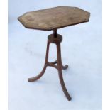 A unusual 18th century style octagonal shaped wine table, raised on a flare tripod base,