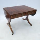 An antique rosewood sofa table, with satinwood cross band and ebonised line inlay,