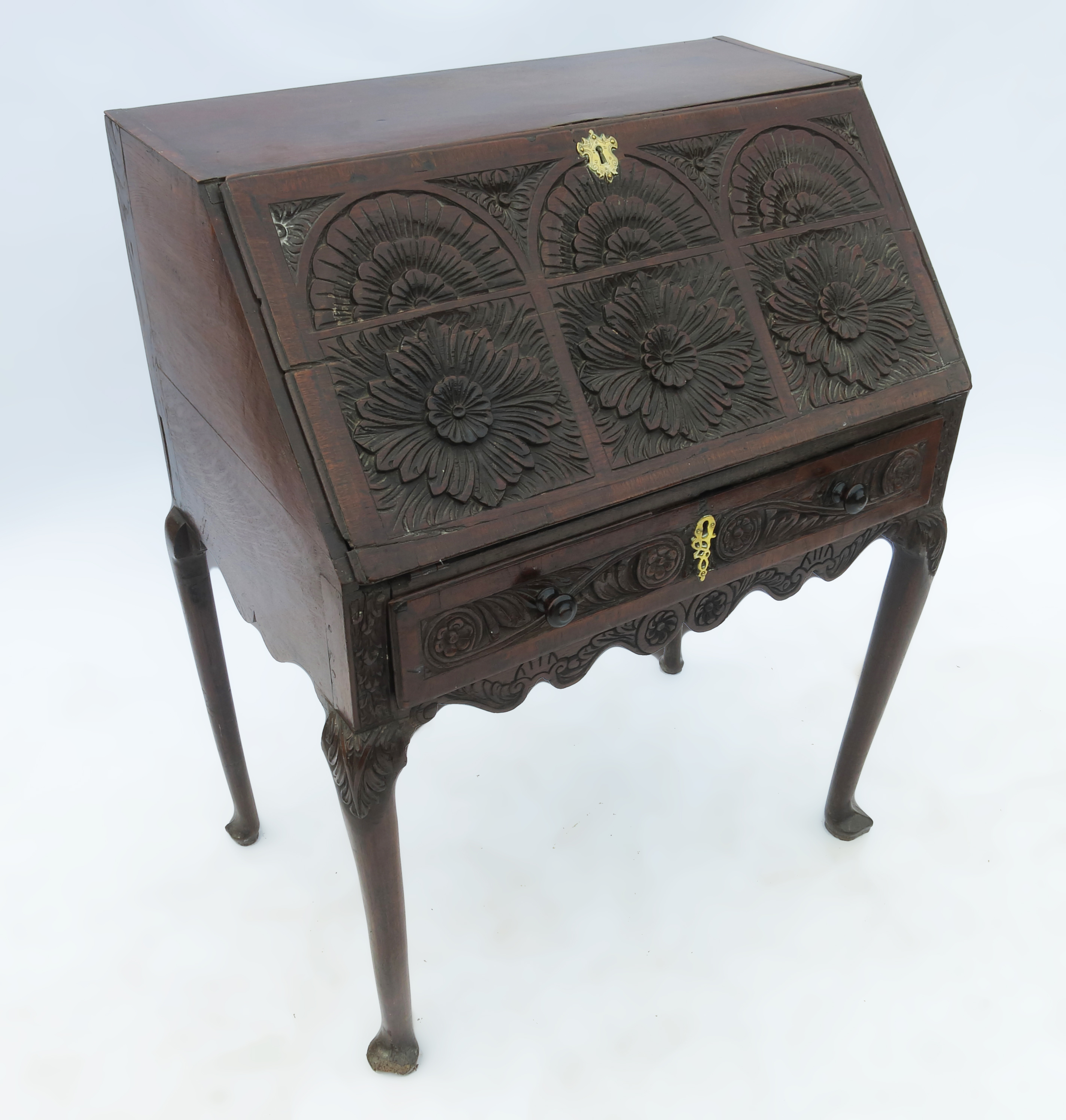 An 18th century oak bureau,