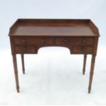 A late Georgian mahogany tray top wash stand, fitted with two drawers over two short drawers,