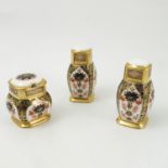 A Royal Crown Derby three piece condiment set, comprising salt, pepper and covered mustard pot,
