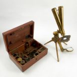 A 19th century portable folding binocular microscope, in fitted mahogany case by J Swift & Son,