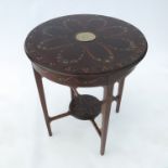 An Edwardian mahogany circular table, inlaid with a Wedgwood plaque,