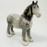 An unmarked Beswick model, of a rocking horse grey shire horse,