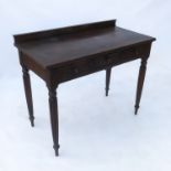 A mahogany washstand, with two frieze drawers and a dummy drawer on four reeded legs, width 39.