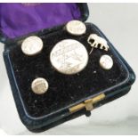 A cased set of Aesthetic movement decorated brooch, earrings and cufflinks,