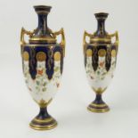 A pair of Coalport vases,