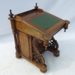 A 19th century walnut Davenport,