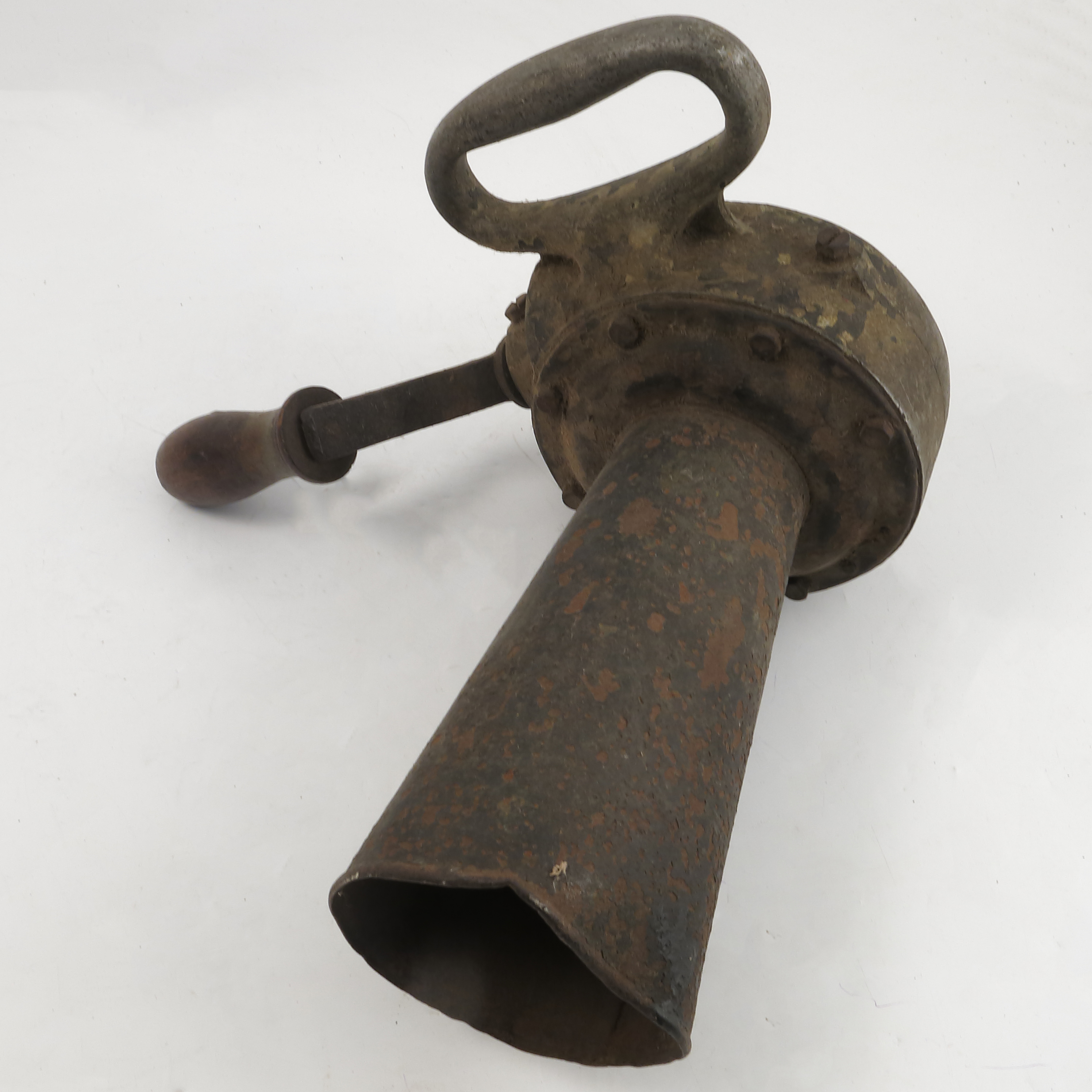 An army issue hand crank air raid siren, model 749,