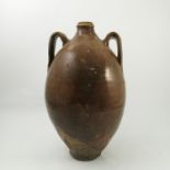 A salt glazed bulbous bodied stoneware storage jar,