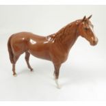 A Beswick model, of a chestnut hunter,