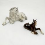 A Beswick model, of a recumbent grey shire mare,