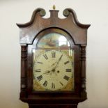 An oak longcase clock, cross banded dial with column,