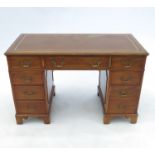 A mahogany writing desk,