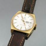 An Omega Geneve Automatic gentleman's gilt coloured wrist watch,