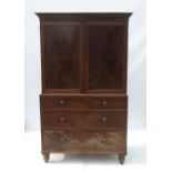 A 19th century mahogany press cupboard,