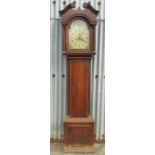 A late Georgian oak cross banded longcase clock, with arch dial, with moon roller,