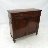 A late Georgian mahogany chiffonier, with two frieze drawers and two blind cupboards below,