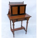 A late 19th century satin wood ladies writing table,