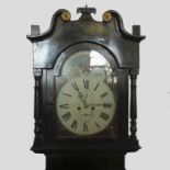 An oak longcase clock, with arched dial and moon roller and subsidiary dials,