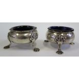 A Matched Pair of Georgian Silver Salts resting on three scallop moulded feet, one 1754, 171g