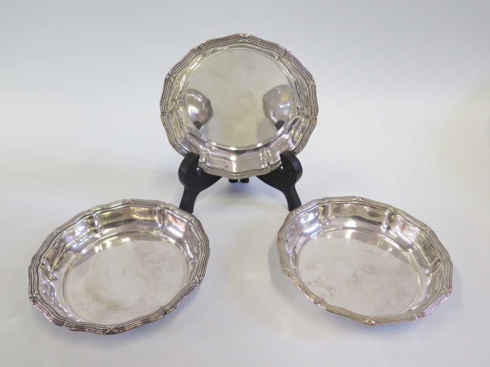 A Set of Three French Electroplated Silver Coasters, marked ODIOT A PARIS DOUBLE 10, 14cm diam