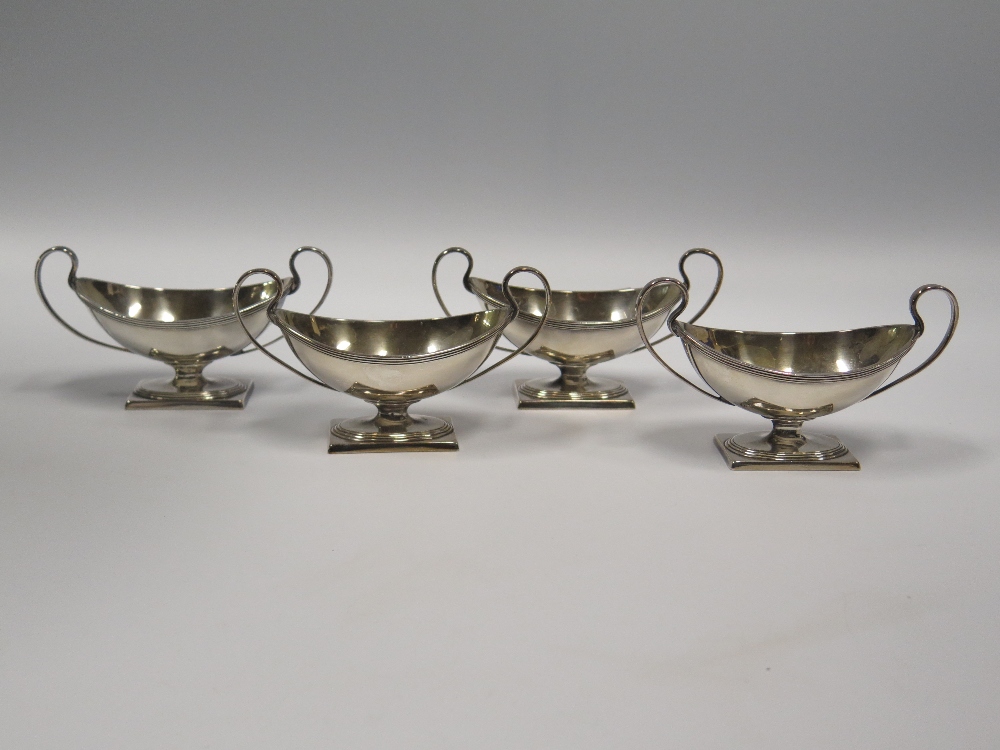 A Set of Four White Metal Two Handled Salts