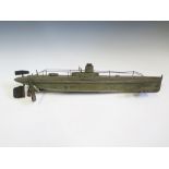 A Marklin Tin Plate Submarine with deck rails, 56cm long and with X-Ray images of the toy