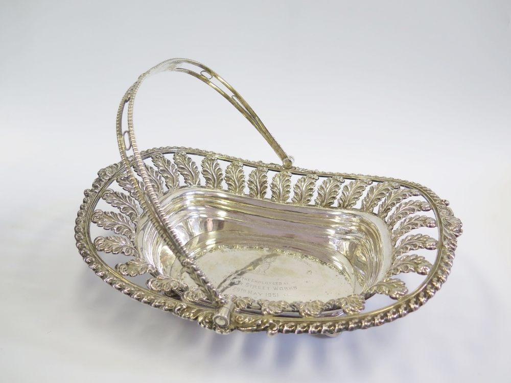 A George III Silver Swing Handled Bread Basket with pierced foliate border, Sheffield 1817, John & - Image 2 of 4