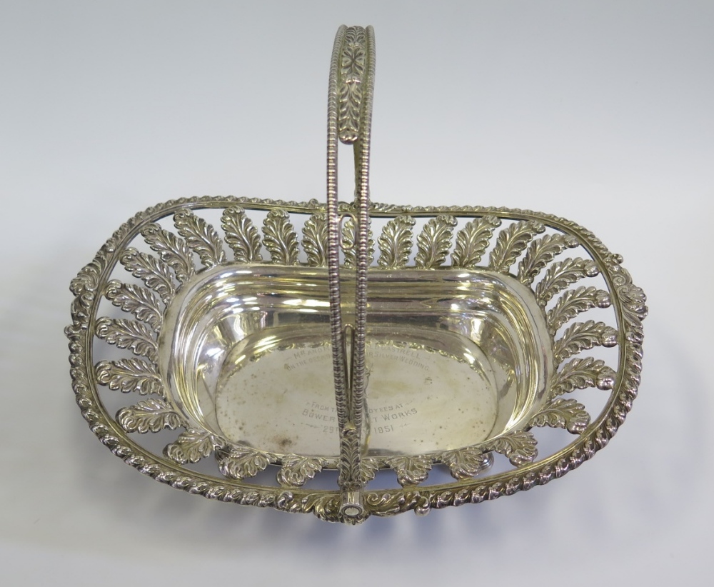 A George III Silver Swing Handled Bread Basket with pierced foliate border, Sheffield 1817, John &