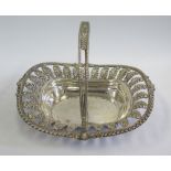 A George III Silver Swing Handled Bread Basket with pierced foliate border, Sheffield 1817, John &