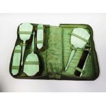An Edward VIII Silver and Green Guilloché Enamel Backed Six Part Mirror & Brush Set in soft case,