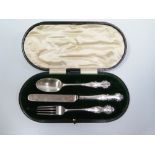 A George V Silver Presentation Cased Three Piece Christening Set, London 1911 and two continental
