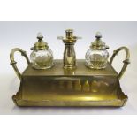 A Georgian Brass Twin Inkwell Two Handled Standish with central candle holder, 30cm wide _ From a