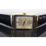 A 1940's Le Coultre 14K Gold Gent's Rectangular Wristwatch with subsidiary seconds dial, the 17