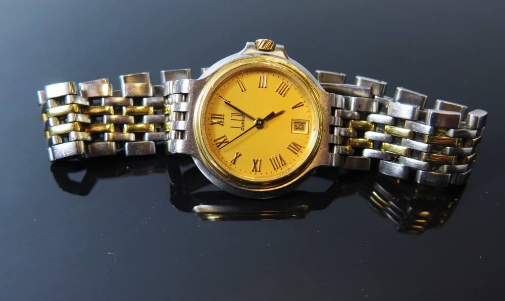 A Dunhill Lady's Quartz Wristwatch with steel and gold case with date aperture, running