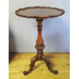 A Good Victorian Rosewood Piecrust Pedestal Wine Table raised on turned column and standing on