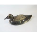 A Painted Decoy Duck with glass eyes