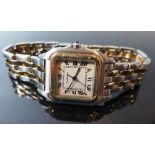 A Cartier Santos Lady's Gold and Steel Wristwatch with date aperture and quartz movement 183949