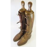 A Pair of Leather Boots with Stretchers