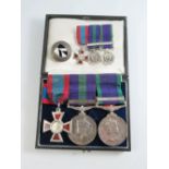 A Three Medal Group _ Royal Red Cross in original box, George VI General Service Medal with Malaya