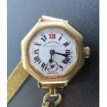 A West End Watch Company Wristwatch in gold plated case