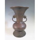 An Early Chinese Bronze Red Splash Two Handled Vase, 26cm