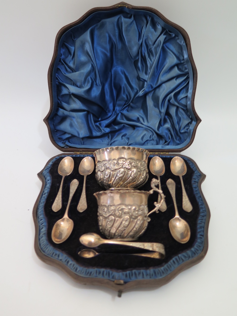 A Victorian Silver Cup and Bowl with six spoons and sugar tongs, London 1894, J.W F.C.W, in