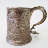 A George II Silver Beer Mug with repoussé floral and foliate scroll decoration, military