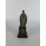 A Silver Sculpture of St. Anthony on an ebonised plinth, 14 cm, English Sterling, marks dirty