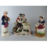 KAISER PORCELAIN FIGURAL GROUP AND TWO STAFFORDSHIRE FIGURES