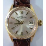 A Rolex Lady's 18ct Gold Oyster Perpetual Date Wristwatch, running