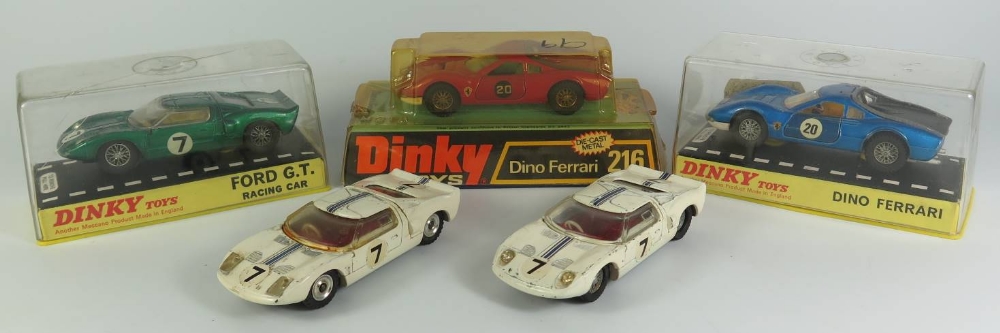 Three Dinky 215 Ford GT Racing Car, one boxed and Two Dinky 216 Dino Ferrari