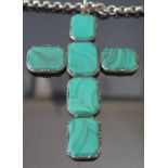 A Malachite Cross in yellow metal mount and on sterling silver chain